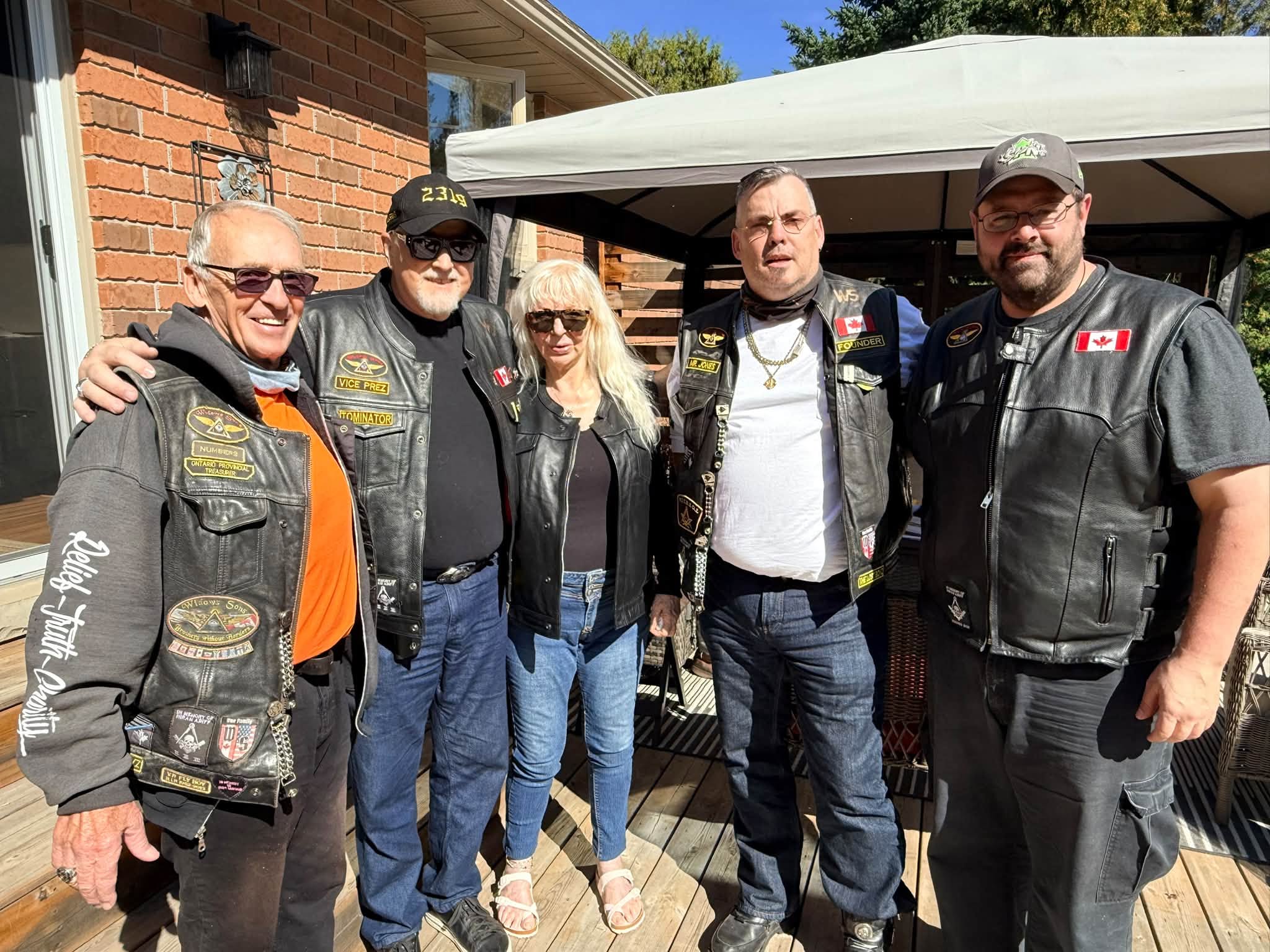 Dufferin Chapter Widows Sons members gathered together with their motorcycles